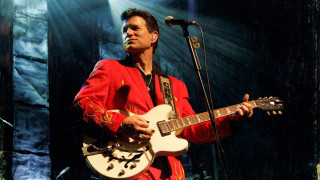 Man red suit guitar stage - jimmy nelsson free wallpaper