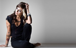 Woman tattoos sitting floor hands - her hand behind her head free wallpaper