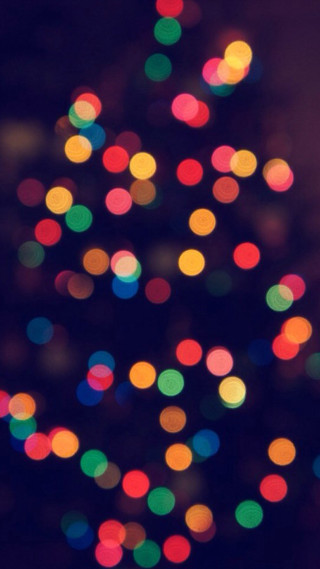 Blurry christmas tree multicolored lights 3 - free holidays wallpaper for mobile