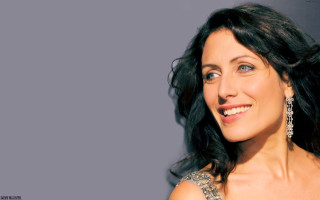 Smiling woman earrings dress happy - a portrait free wallpaper