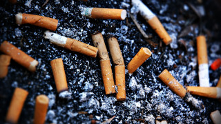 Cigarettes smoke table lighter pile - a table top free wallpaper