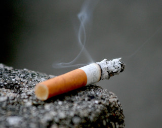 Cigarette lit rock smoke middle - a rock free wallpaper