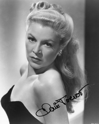 Woman black dress portrait greyscale - her right arm behind her head free wallpaper for mobile