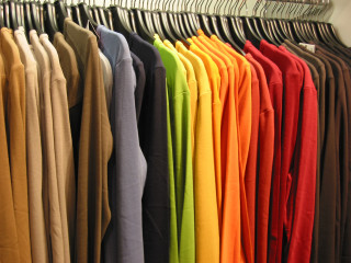 Rack of shirts and pants - postminimalism free wallpaper