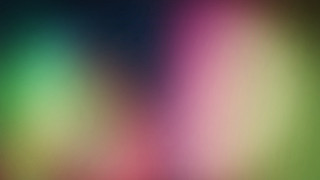 Blurry image of a green - chromatic aberration free wallpaper