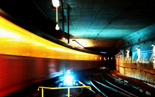 Train tunnel loading platform lights 2 - a train traveling free wallpaper