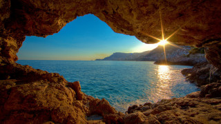 Ocean view cave sunlight rocks - a view of the ocean free wallpaper