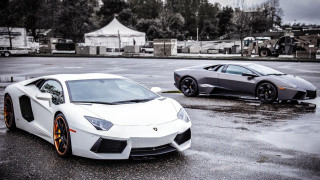 Two white sports cars rainy - free cars wallpaper