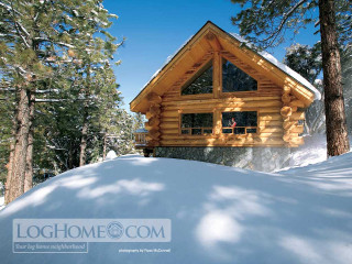 Snowy log cabin forest bench - kinkade free wallpaper