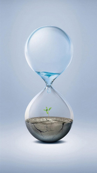 Glass hourglass plant growing inside - sense of depth free wallpaper for mobile