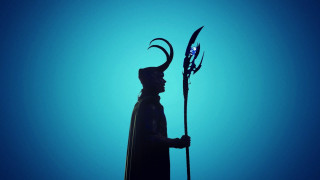 Horned man statue backlit staff - a spear free wallpaper