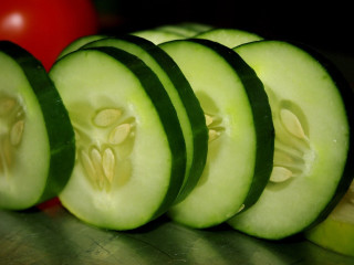 Sliced cucumbers tomatoes knife closeup - tomato free wallpaper