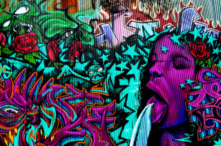 Woman mouth open graffiti knife - a graffiti wall free wallpaper