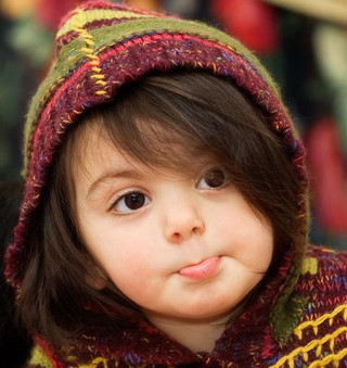 Little girl colorful knitted hoodie - little free wallpaper for tablet