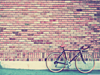 Bicycle brick wall sidewalk building - a bicycle free wallpaper