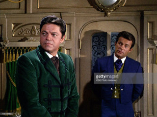 Two men suits room clock - fletcher martin free wallpaper