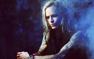 Man long hair tattoos sitting 2 - jimmy nelsson free wallpaper