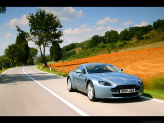 Blue sports car country road - tree and grass free wallpaper