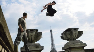 Man jumping off ledge eiffel - fabien charuau free wallpaper