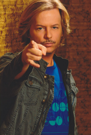 Man serious mustache pointing blue - a blue shirt free wallpaper for mobile