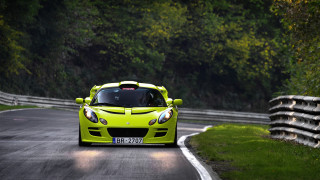 Yellow sports car driving road - bright color free wallpaper