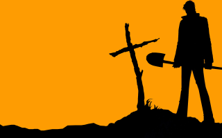 Man holding shovel cross hill - a yellow sky in the background free wallpaper