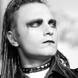 Man dreadlocks tie looking up - his neck free wallpaper for tablet