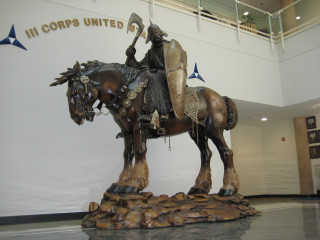 Statue man horse building corpps - a sign above free wallpaper