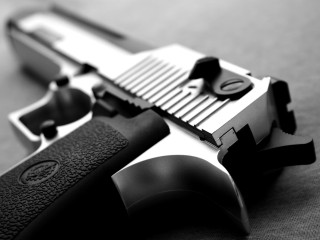 Gun black grip handle tabletop - a black handle free wallpaper