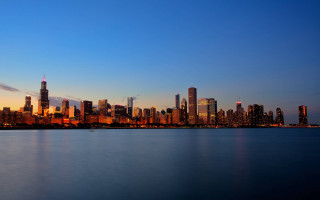 City skyline water dusk blue - a body of water in front free wallpaper