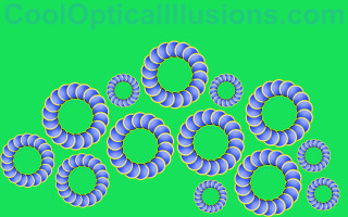 Blue yellow circles green background - optical illusion free wallpaper