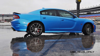 Blue sports car rainy day - lot free wallpaper