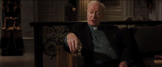 Man priest outfit holding glass - aloysius okelly free wallpaper