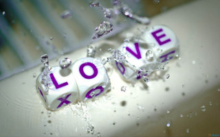 Love dices floating water splashing - the word love free wallpaper