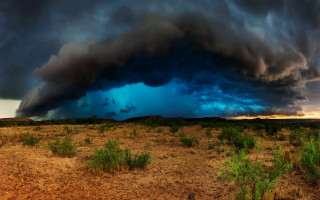 Storm cloud desert green plants - stormy weather free wallpaper