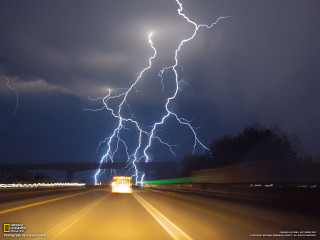 Lightning bolt highway night truck - a truck driving free wallpaper