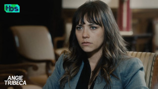 Woman sitting serious look chair - her face and shoulder free wallpaper