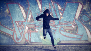 Man black hoodie skateboarding graffiti - a graffiti wall free wallpaper
