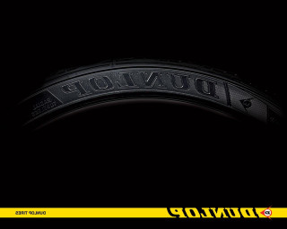 Black tire yellow stripe duntop - a black tire free wallpaper