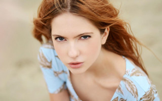 Red haired woman blowing wind 3 - free portrait wallpaper for desktop