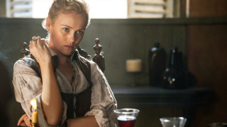 Woman sitting table candle wine - a candle free wallpaper