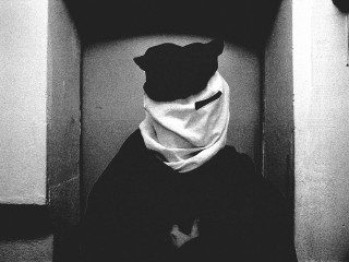 Person hat scarf sitting corner - symbolist free wallpaper