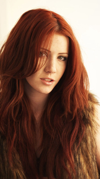 Woman red hair fur vest - a character portrait free wallpaper