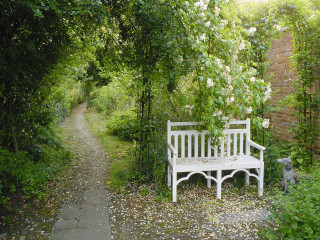 White bench forest brick building - peaceful free wallpaper