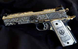 Gold silver gun cloisonnism jigsaw - a black background behind free wallpaper