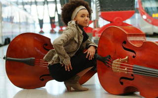 Woman kneeling instrument train bus - chinwe chukwuogoroy free wallpaper