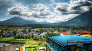 City mountains blue tarp bridge - a view of a city free wallpaper
