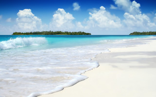 Beach wave island trees distance 2 - a small island in the distance free wallpaper