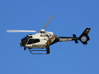 Helicopter flying blue sky propeller - a propeller free wallpaper