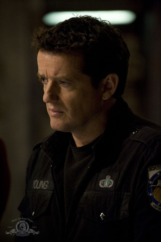 Man black jacket serious look 9 - free space wallpaper